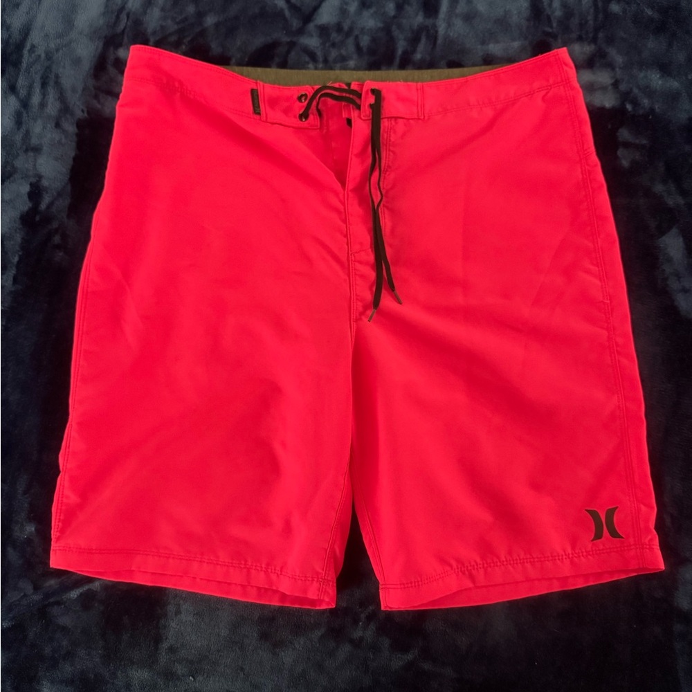 Hurley Men's Bright pink Board Shorts
Size 34
20”